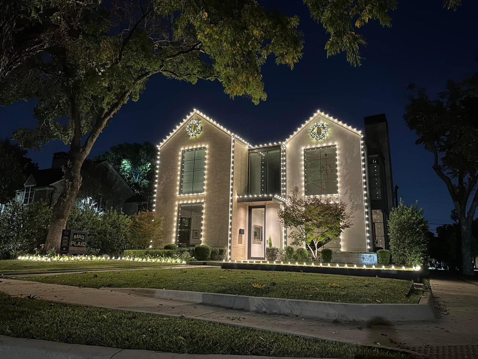 Real Christmas light installation Highland Park TX modern home with C9 LED