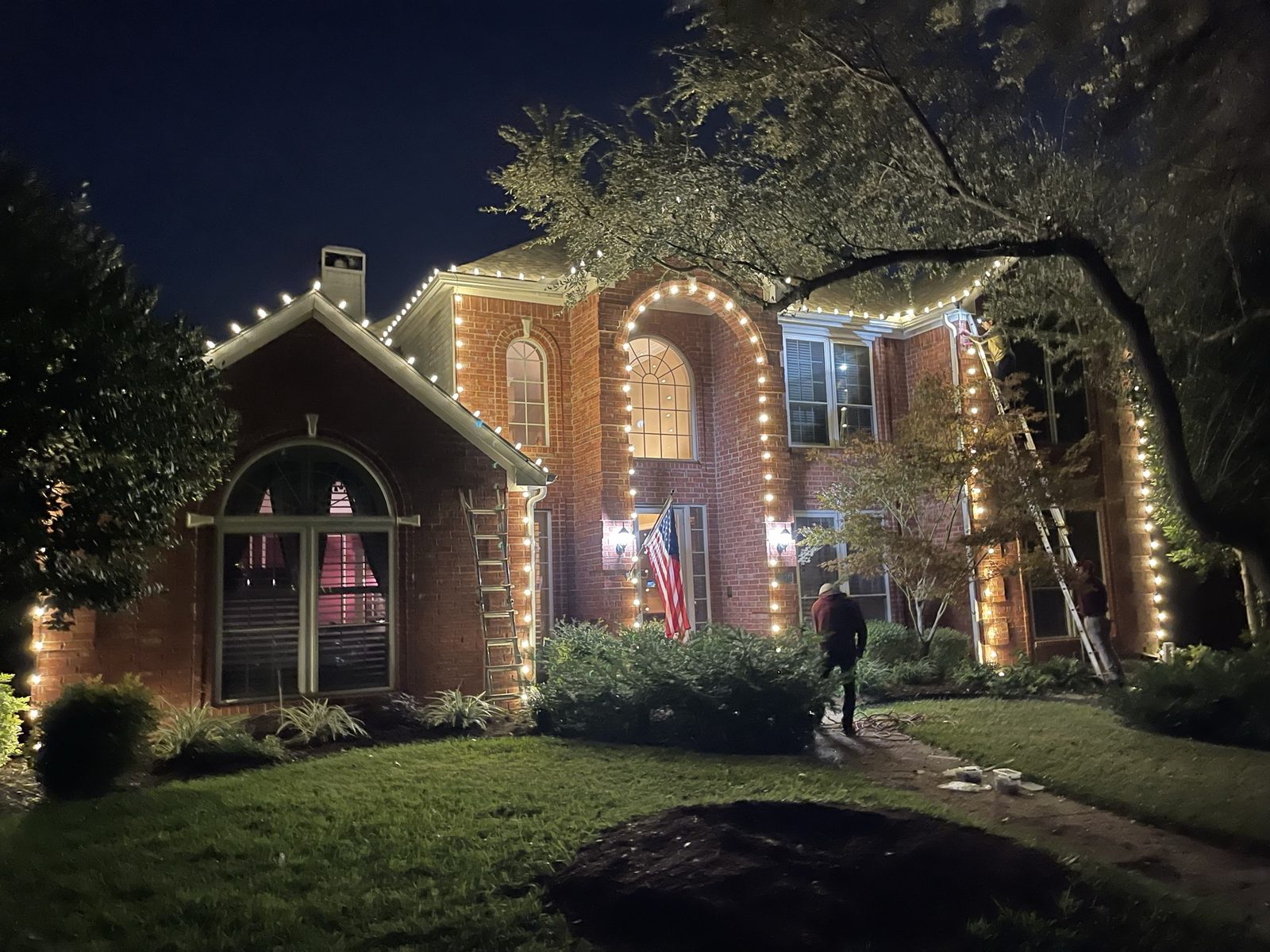 Christmas lights Allen TX brick two-story home warm white C9
